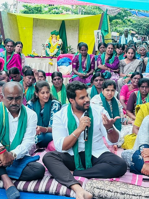 JDS Youth Wing president Nikhil Kumaraswamy protests against the acquisition of land for the Bidadi Township Project at Ramanagara district, on Friday  