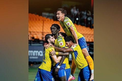 Kerala Blasters players celebrate after scoring the opener against NorthEast United in their ISL encounter in Kochi on April 15, 2026.