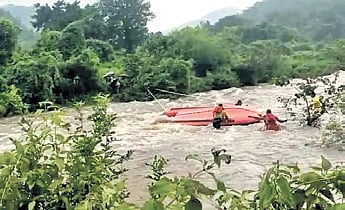 Fire Services teams from Bhanjanagar and Belaguntha made repeated attempts to cross the river using a boat and rope.