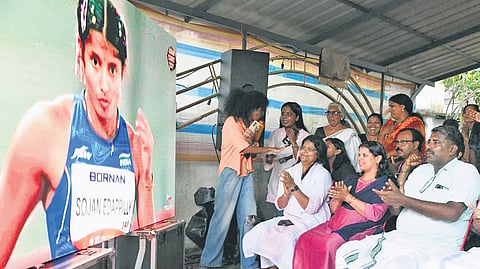 MP Jebi Mather along with Ancy’s family and neighbours in Nattika watches her Asian Games performance