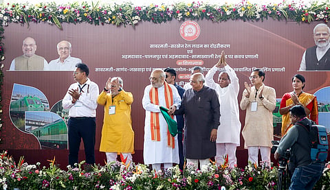 Union Home Minister Amit Shah with Gujarat Chief Minister Bhupendra Patel, and others, flags off India's first dual-fuel LNG train from Sabarmati Railway Station, in Ahmedabad, Gujarat. 