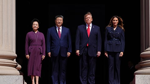 US President Donald Trump, center right, first lady Melania Trump, right, China's President Xi Jinping, center left, and his wife Peng Liyuan arrive at the National Archives Museum, Friday, Sept. 25, 2026, in Washington. 