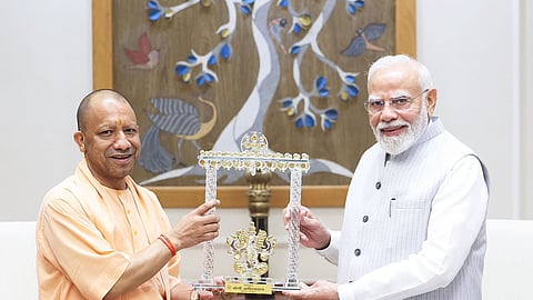 UP CM Yogi Adityanath with PM Narendra Modi in Delhi on Saturday.