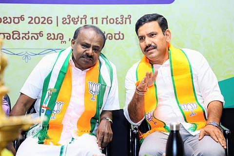 Union Minister HD Kumaraswamy and BJP state chief BY Vijayendra at a meeting on Saturday