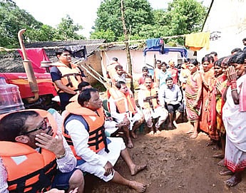 CM Mohan Charan Majhi interacting with flood-affected people in Koraput district