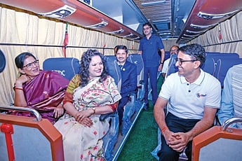Deputy CM Pravati Parida, CS Anu Garg in one of the new luxury coaches