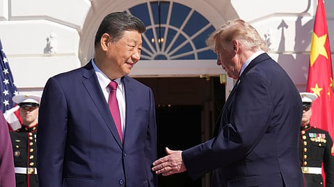 President Donald Trump, right, greets China's President Xi Jinping upon arrival at the South Portico of the White House, Friday, Sept. 25, 2026, in Washington.