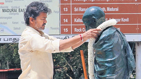Chief Minister C Joseph Vijay garlanding the statue of Mahatma Gandhi at the memorial museum in Madurai on Monday 