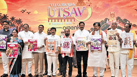 Tourism Minister Kandula Durgesh, Health Minister Y Satya Kumar Yadav, MP Kesineni Sivanath releasing flyer of Vijayawada Utsav 2.0 