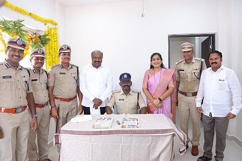 Anitha visited a stall set up by the Fire Department and enquired about the functioning of various firefighting equipment.