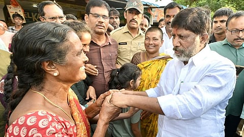 A woman greets Deputy Chief Minister Mallu Bhatti Vikramarka during his visit to Mudigonda on Sunday.