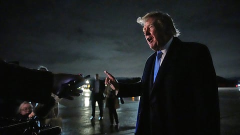 President Donald Trump speaks with reporters upon arriving, Sunday, Sept. 27, 2026, at Joint Base Andrews, Md
