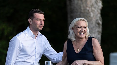 Far-right party National Rally president Jordan Bardella and far-right leader Marine Le Pen attend a rally in Lievin, northern France, on July 4, 2026. 