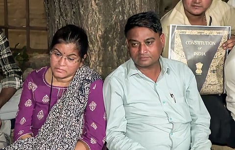  Ravindra and Sonali Wakode, parents of the IIT Bombay student who died by suicide, sit on a protest at Azad Maidan to demand justice, in Mumbai.