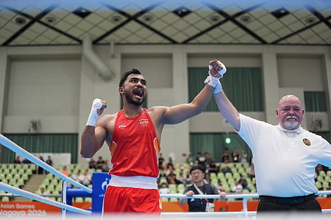 Kapil Pokhariya rejoices after getting his hand raised on Monday