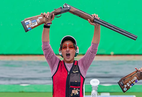 Neeru Dhanda rejoices after capturing the gold medal in women's trap on Tuesday
