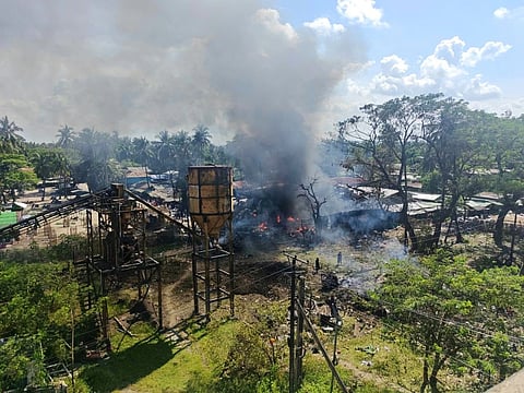 In this photo provided by Wai Hun Aung, smoke rises from a market after the area was allegedly hit by the military's airstrike in Kyauktaw township in Rakhine state, Myanmar, Monday, Sept. 28, 2026.