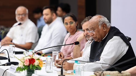 Congress president Mallikarjun Kharge, Lok Sabha Leader of Opposition Rahul Gandhi, NCP (SP) leader Supriya Sule and others during the INDIA bloc meeting to finalise an action plan for a joint agitation over alleged irregularities in the SIR exercise and to press for CEC Gyanesh Kumar's resignation, in New Delhi. 