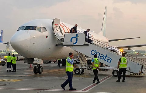 Israeli tourists leave a FlyDubai plane which departed from Ben-Gurion International Airport in Tel Aviv and landed in Dubai, United Arab Emirates, Nov. 8, 2020.
