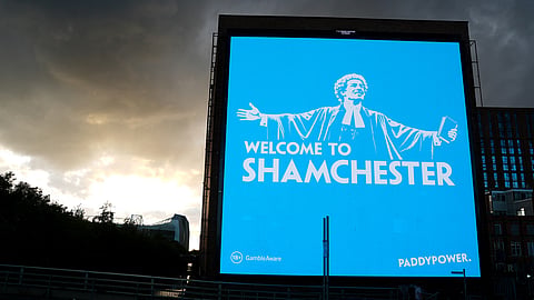 A general view of a billboard featuring a Paddy Power advert that reads 'Shamchester', in Manchester, England, Wednesday, Sept. 30, 2026.