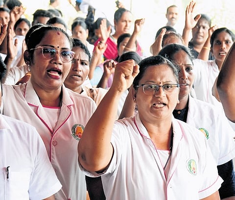 Tamil Nadu Nurses Empowerment Association holds one-day hunger strike at Swami Sivanandha salai in Chennai on Wednesday against contractual hiring.