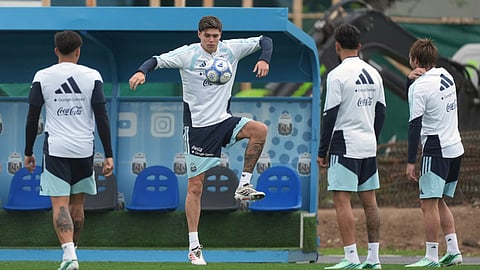 Argentina's Tomas Palacios controls the ball as he trains with his team for an international friendly soccer match against Bolivia in Buenos Aires, Argentina, Tuesday, Sept. 29, 2026.