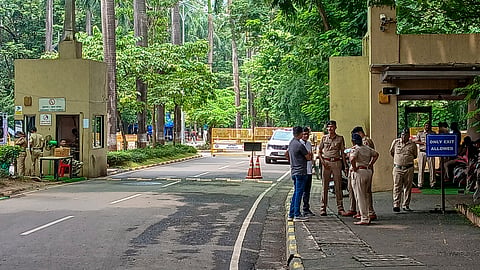  Police personnel stand guard outside Indian Institute of Technology (IIT) Bombay campus following the recent death by suicide of a 22-year-old second-year B Tech student, in Mumbai, Maharashtra, Tuesday, Sept. 22, 2026.
