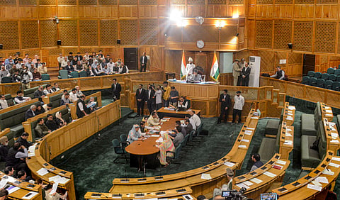 Jammu and Kashmir Assembly Speaker Abdul Rahim Rather looks on empty seats after opposition MLAs staged a walkout during the autumn session of the UT's Assembly, in Srinagar, Tuesday, Sept. 29, 2026. Ruckus erupted in the Assembly over the adoption of a resolution moved by CM Omar Abdullah a day ago, demanding urgent restoration of full statehood.