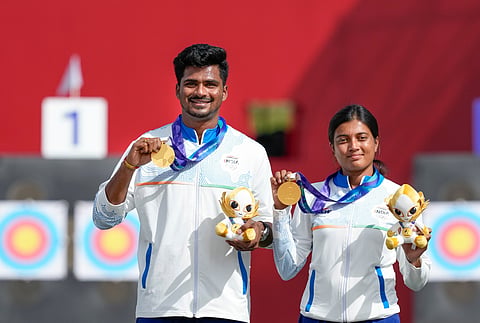 T Chikitha and Sahil Jadhav (L) after pocketing the gold in the mixed team final