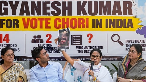 TMC supremo Mamata Banerjee addresses a press conference, in New Delhi, Thursday, Oct. 1, 2026. Party National General Secretary and MP Abhishek Banerjee, second left, and others are also present.
