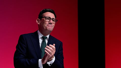 British Prime Minister Andy Burnham applauds on stage at the Labour Party Conference in Liverpool, England, Wednesday, Sept. 30, 2026.