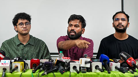 Cockroach Janta Party (CJP) founder Abhijeet Dipke, centre, addresses a press conference as co-conveners Saurav Das, left, and Ashutosh Ranka look on, in New Delhi, Thursday, Sept. 24, 2026. 