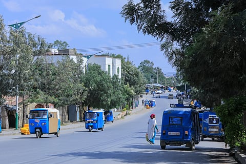 People walk in Mekelle, the capital of Ethiopia's Tigray region, as fighting escalates with the central government, Thursday, Sept. 24, 2026. 