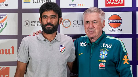 India's football team head coach Khalid Jamil (L) with Brazil's head coach Carlo Ancelotti during a press conference on Friday