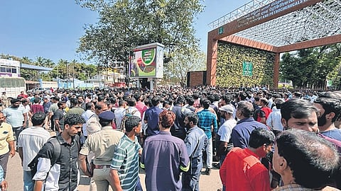 Contractual workers protest in front of MRPL a day after the refinery fire in Mangaluru on Thursday.