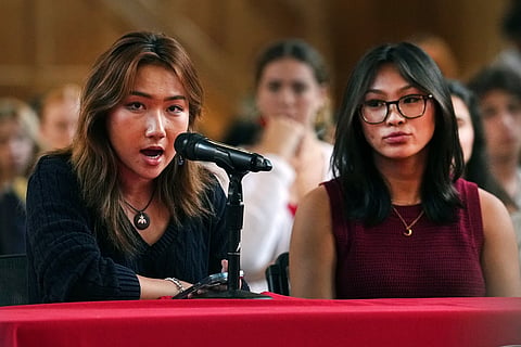 Cornell University students and ACLU student chapter members Jane Wang, left and Sophia Riley Sim, speak about sexual violence on campus during a student assembly meeting at Cornell University in Ithaca, N.Y., Thursday, Oct. 1, 2026. 