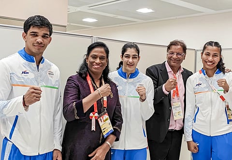 Gold medallists Ankush Panghal (L), Parveen Hooda (c) and Lovlina Borgohain (R) with IOA president PT Usha and BFI chief Ajay Singh