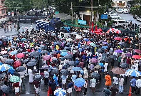 Protesters gather in front of the Secretariat on Thursday following a call by the CPM district committee, condemning the police assault on SFI activists at the university hostel in Thiruvananthapuram.