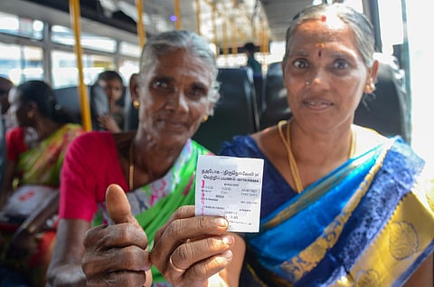 Women passengers board a government bus at the Tirunelveli New Bus Stand after the launch of the "Vettri Payanam Thittam", which expands free bus travel for women in Tamil Nadu 