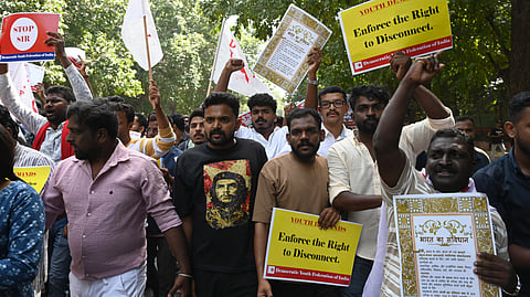 People protest against alleged irregularities related to the SIR of rolls at Jantar Mantar in New Delhi on Friday.