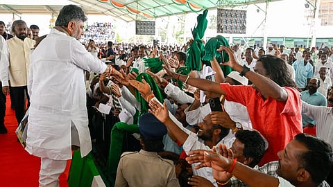 Chief Minister DK Shivakumar interacts with the gathering during the Praja Seva Andolana programme in Periyapatna taluk on Saturday.