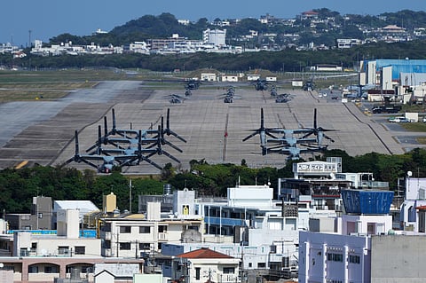 FILE - U.S. MV-22 Osprey transport aircraft are parked at the U.S. Marine Corps Air Station Futenma in Ginowan, on the main island of the Okinawa archipelago, southern Japan, Tuesday, Feb. 18, 2025.