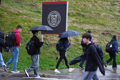Students walk across the campus of Cornell University in Ithaca, N.Y., Thursday, Oct. 1, 2026.