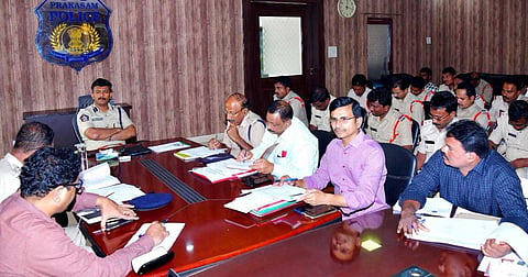 SP V Harshavardhan Raju reviews September performance with officers.