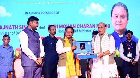 Chief Minister Mohan Charan Majhi greets Defence Minister Rajnath Singh by presenting him local products of Koraput at HAL Sunabeda.