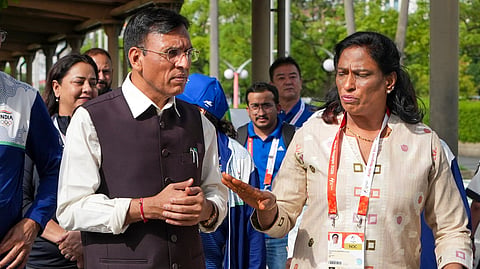 Union Youth Affairs and Sports Minister Mansukh Mandaviya (L) along with Indian Olympic Association President PT Usha.