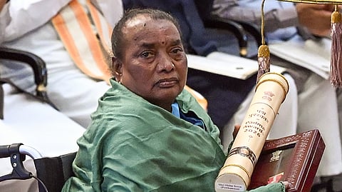 In this photo from June 23, 2026, Rupi Soren receives the Padma Bhushan award posthumously conferred upon her husband and JMM patriarch Shibu Soren (posthumous) in New Delhi.