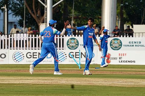 Suryansh Shedge celebrates a wicket in Puducherry on Tuesday