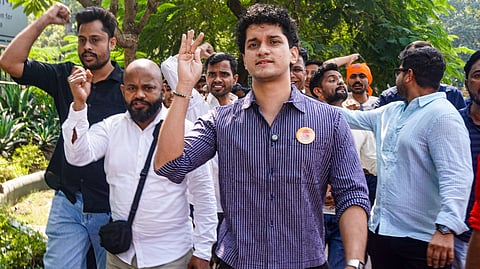Cockroach Janta Party (CJP) co-convenor and spokesperson Saurav Das, along with party supporters, marches towards the Parliament Street Police Station from Patel Chowk, in New Delhi, Wednesday, Oct. 7, 2026.