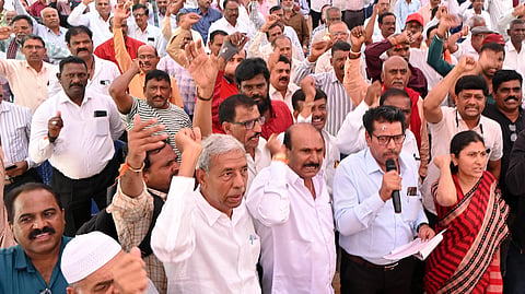 Members of the Joint Action Committee of Corporation Workers Unions for KSRTC protest at Freedom Park in Bengaluru on Wednesday.